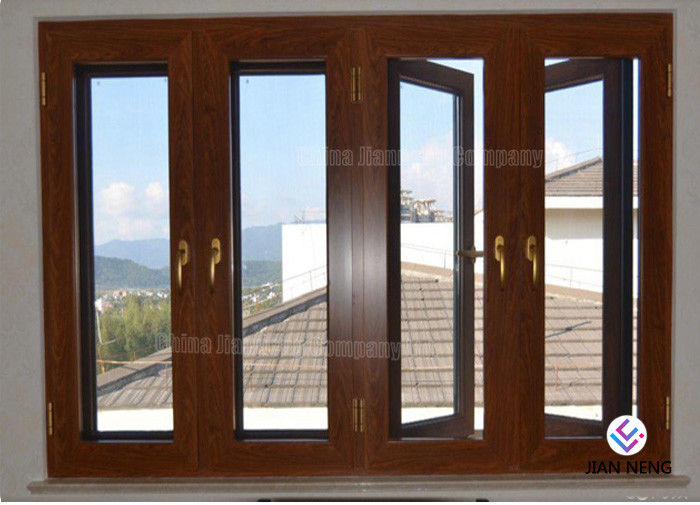 Portelli scorrevoli di alluminio dell'edificio residenziale e Windows, porte di entrata di alluminio con la zanzariera della vetroresina